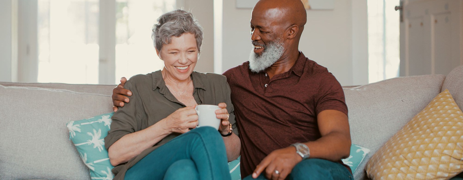 a man and a woman sitting on a couch
