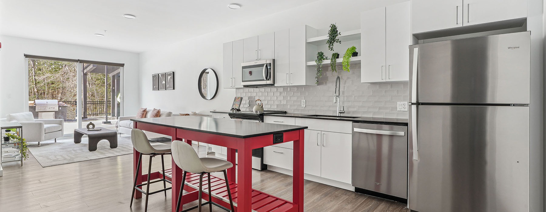 a kitchen with white cabinets